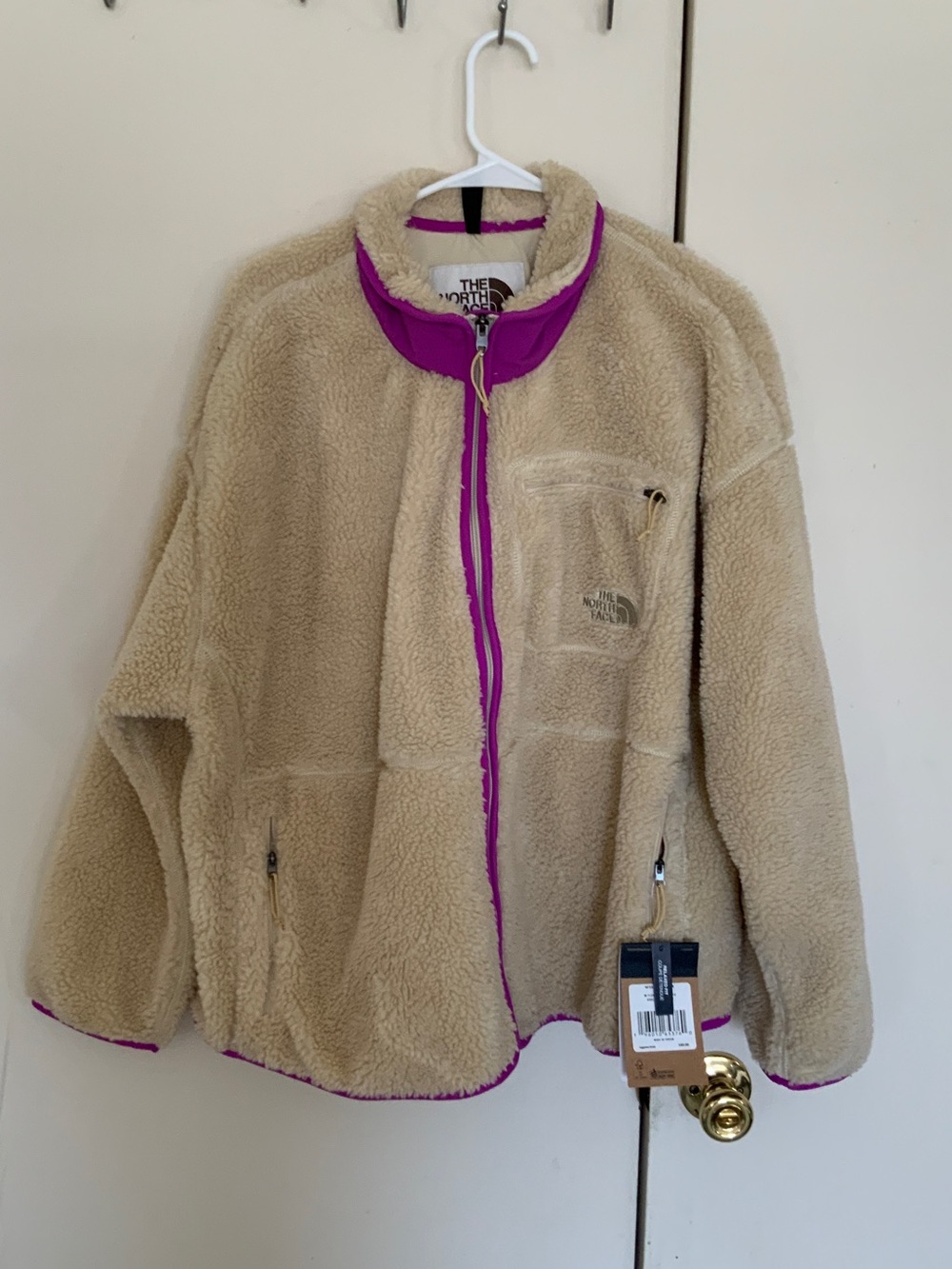 The North Face Women's Cream Sherpa Jacket with Purple Trim
